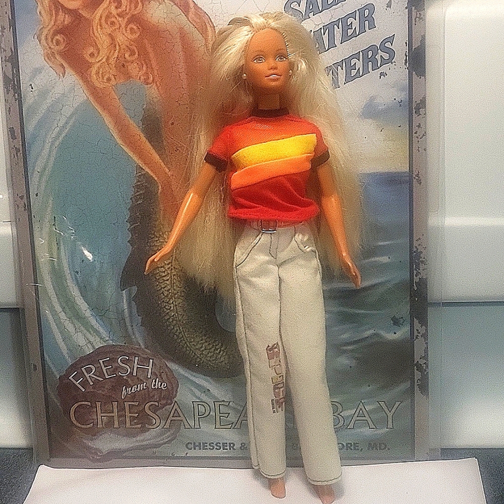 Long-haired Rare Barbie with Blonde Hair with Brown streaks.